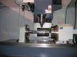 Four axle linkage machining center