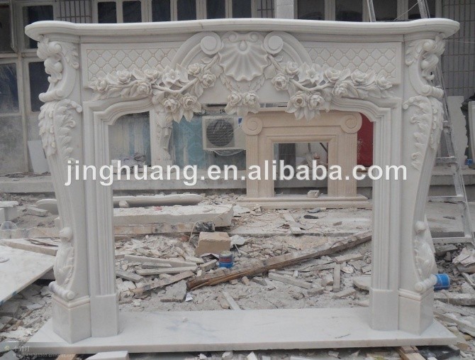 White marble carved fireplace mantel