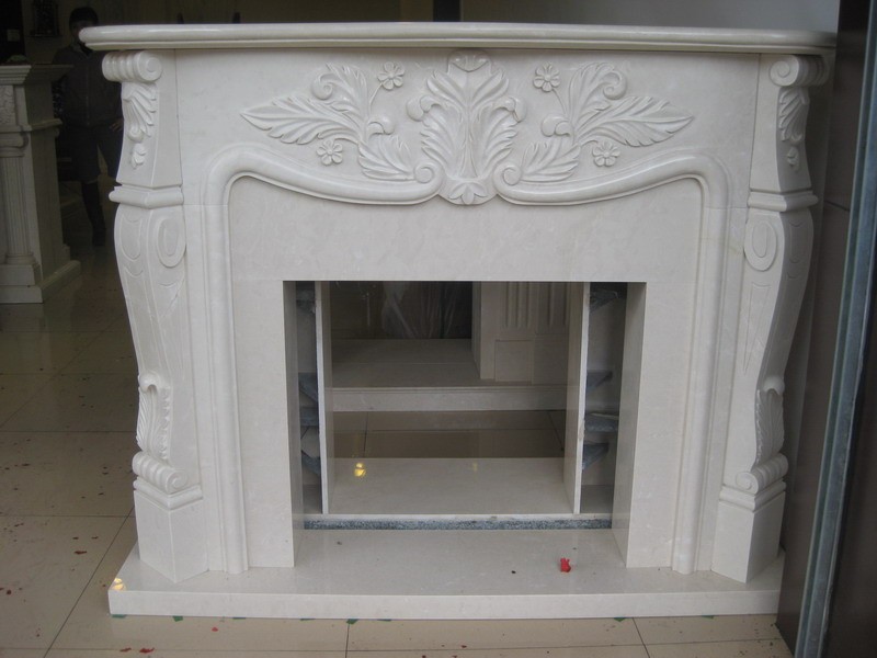 White marble carved fireplace mantel