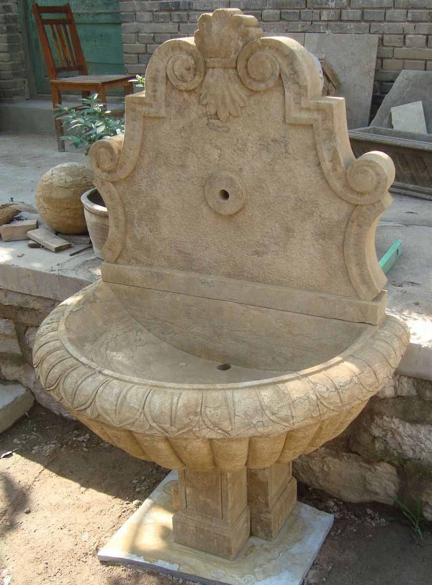 Limestone wall fountain