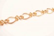 Twisted line brass ring figure chain