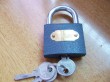 grey color iron padlock